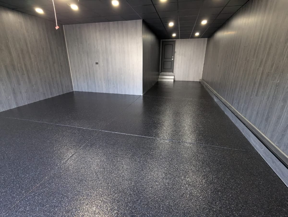 Garage with a finished gray flake epoxy floor in Bartlett, IL